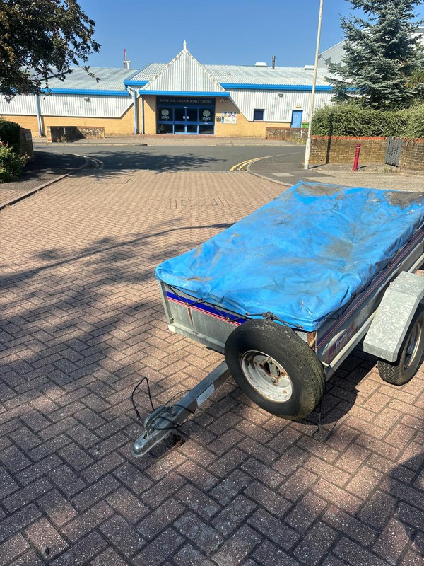 Trailer with cover and spare tyre Trailer with cover and spare tyre