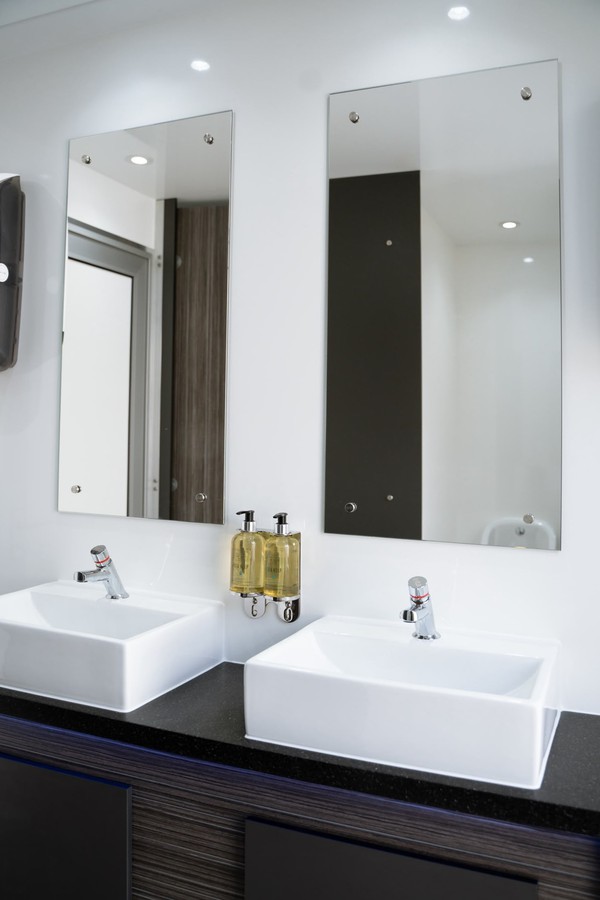Toilet trailer with white and wood interior Toilet trailer with white and wood interior