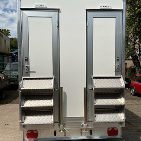 White 4 Bay Mobile Toilet Trailer