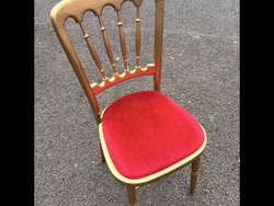 180x Gold Cheltenham banqueting  chairs / red pads