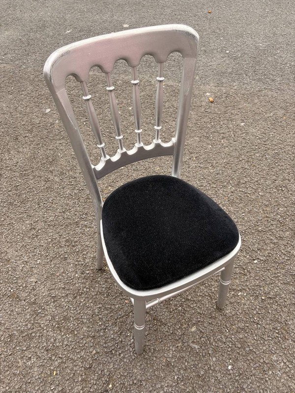 180 x Silver chairs / black pads for sale 180 x Silver chairs / black pads for sale