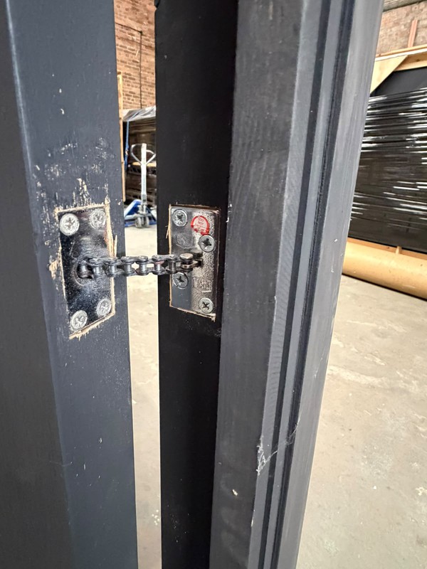 Double door with concealed barrel chain door closer Double door with concealed barrel chain door closer