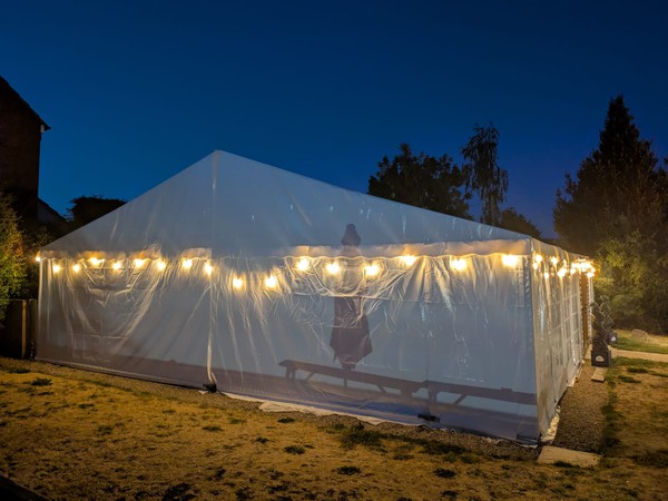 Marquee with festoon lighting Marquee with festoon lighting