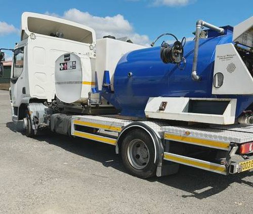 Toilet service truck with bunded fuel tank