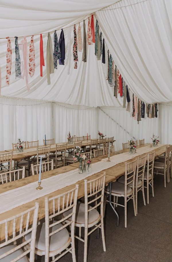Marquee wedding with rustic wooden trestles Marquee wedding with rustic wooden trestles