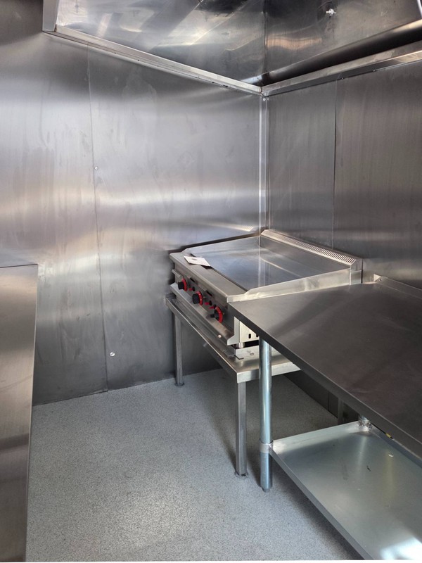 Catering trailer with LPG cooking equipment.