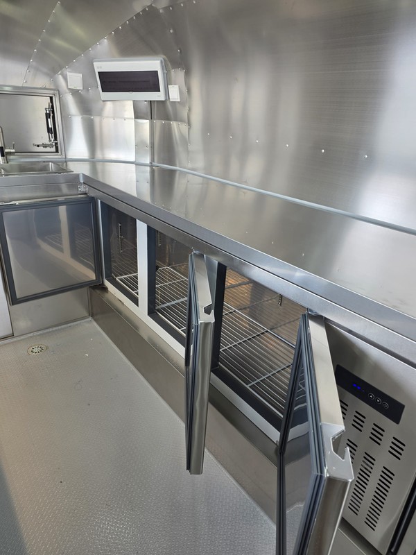 Catering trailer with bench fridge