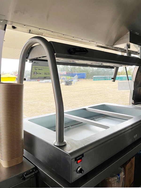 Catering trailer with heated food storage