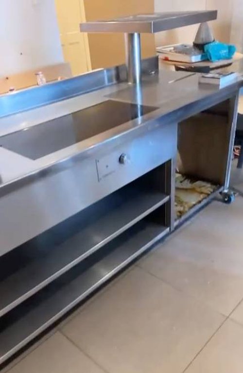 Stainless steel prep counter with induction hobs