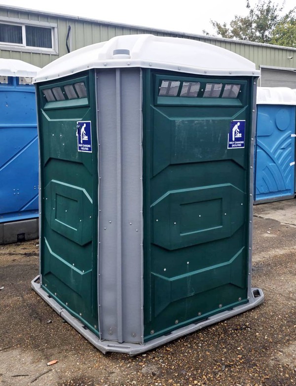 Wheel chair toilet unit with baby changing