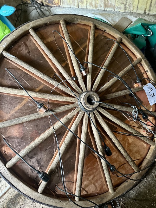 Wagon-wheel chandelier with lighting Wagon-wheel chandelier with lighting