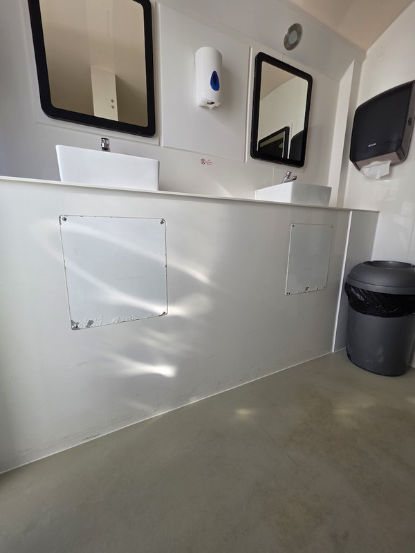 Inside GigLoo 3+2 Toilet Trailer