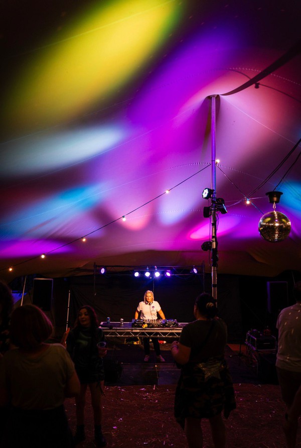 DJ in a stretch tent / rave DJ in a stretch tent / rave
