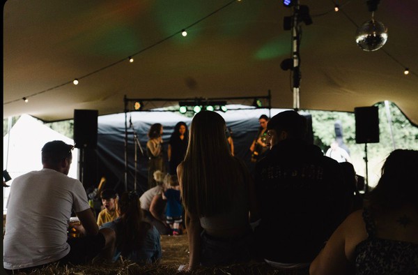 Festival stretch tent with band performing Festival stretch tent with band performing