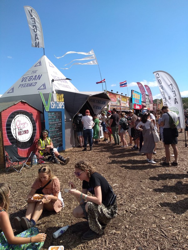 Glastonbury stage Pyramid Marquee - food stall Glastonbury stage Pyramid Marquee - food stall