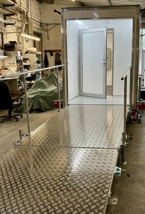 Disabled toilet unit with accessible ramp
