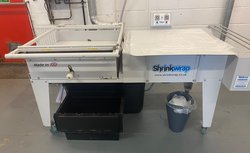 Shrinkwrap Packaging System With Compressor