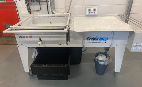 Shrinkwrap Packaging System With Compressor