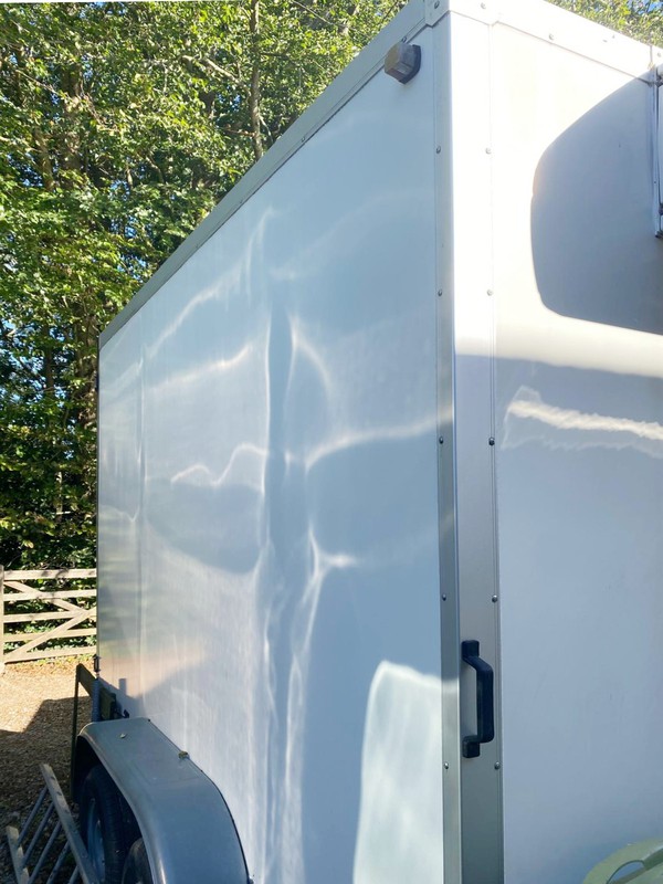 White fridge trailer with twin wheels