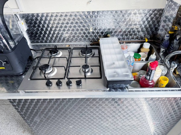 Double stainless steel sink and four burner stove Double stainless steel sink and four burner stove