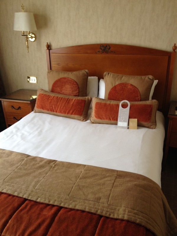 Double bed with mattress and headboard