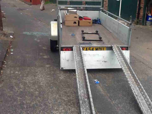 Trailer with loading ramps