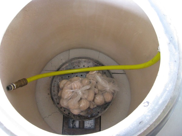 Clay pot with stones