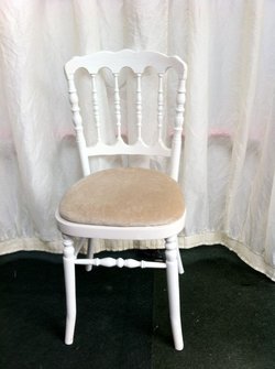 White Napoleon style banqueting chairs