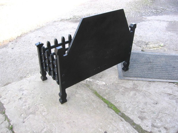 Cast Iron Fire Grate with ornate back plate for sale