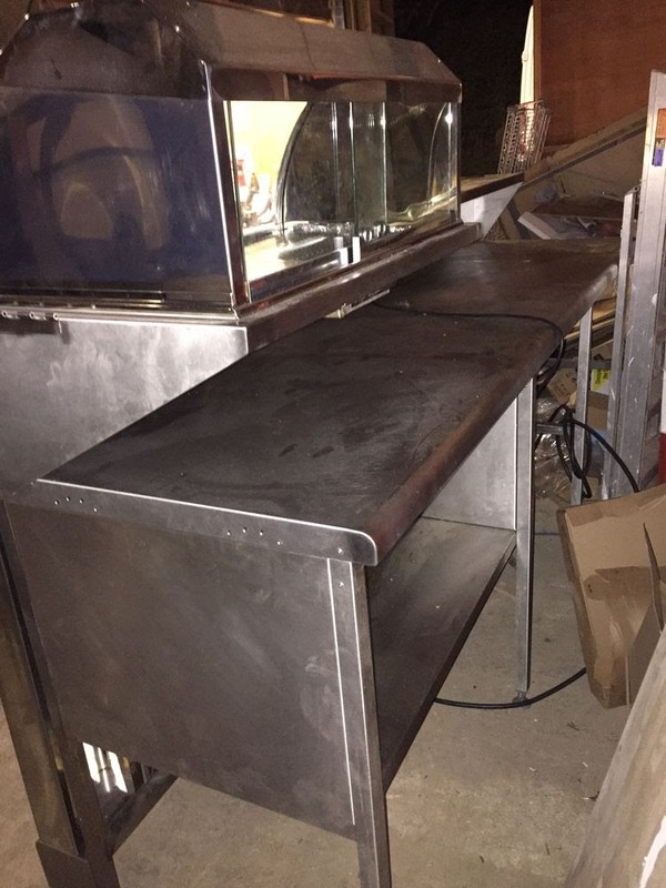 Used fish and chip shop serving counter