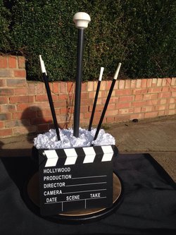 Top hat Hollywood style table centres