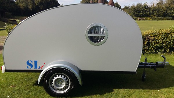 Round window in camping trailer hire