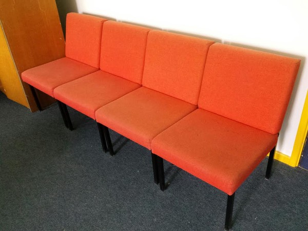 Orange waiting room chairs