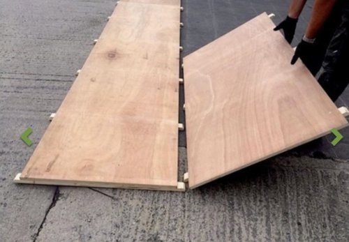 Wooden interlocking flooring for marquees