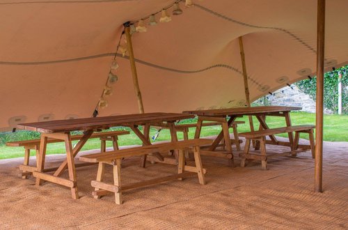 Rustic trestle tables and benches Rustic trestle tables and benches