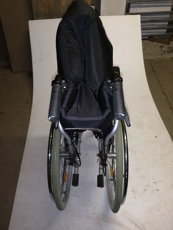 Folded up wheel chairs