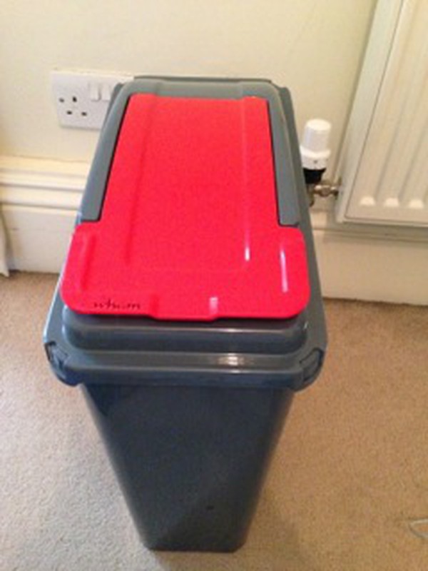 red recycling bin