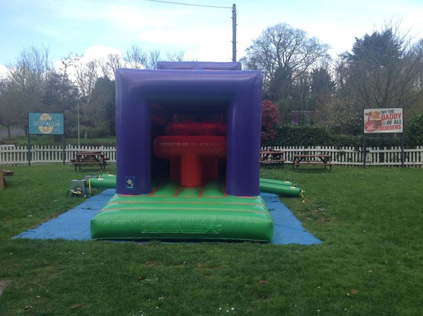 Obstacle course with large slide