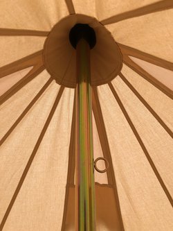 Apex of the canvas bell tent.