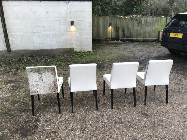 White / cream chairs with fur detail