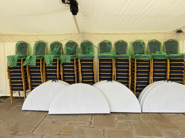 Banqueting chairs and folding round tables