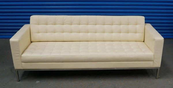 Three seater white or Cream sofa