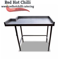 Stainless steel table with upstand