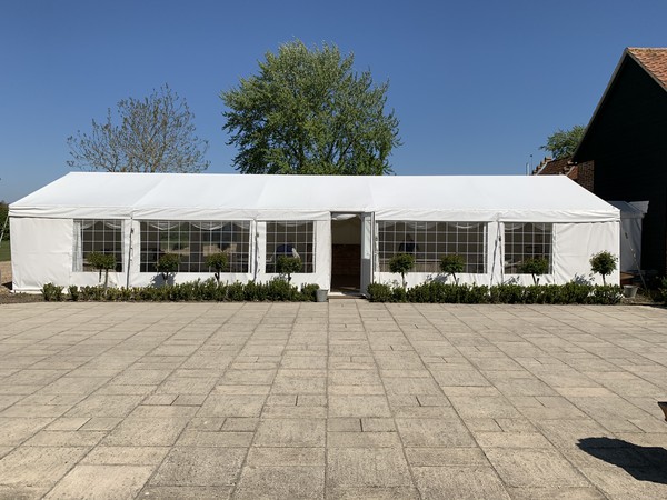 White framed marquee with lining and doors