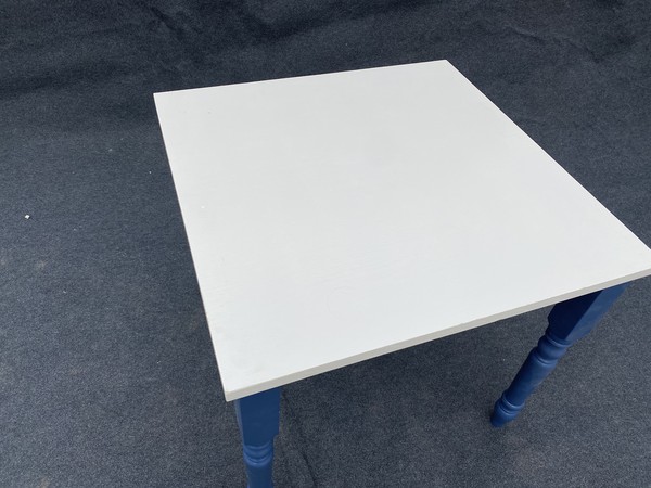 Square table with white top