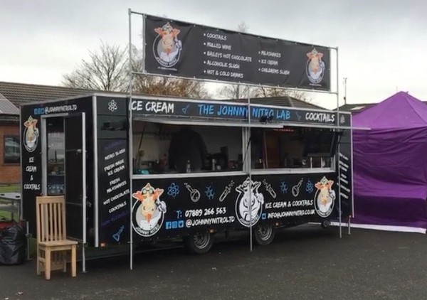 Festival catering trailer with banner