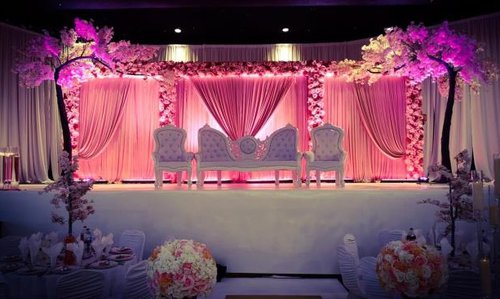 30ft x 10ft floral pillar stage 30ft x 10ft floral pillar stage