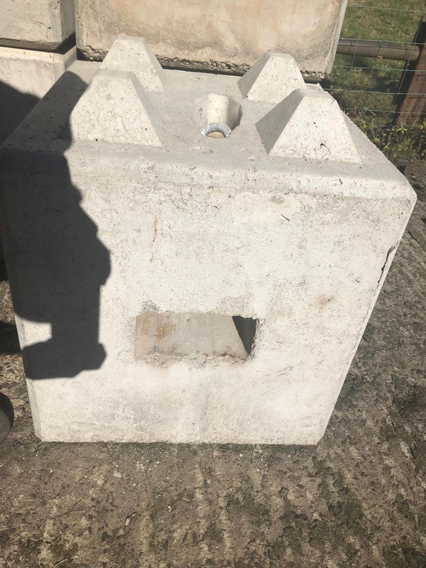 Concrete weights with fork lift pockets and attachment points
