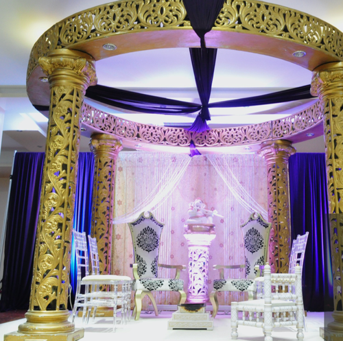 Gold Mandap with pillars Gold Mandap with pillars