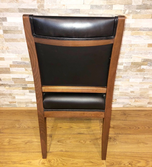 Wooden dining chairs with black leather